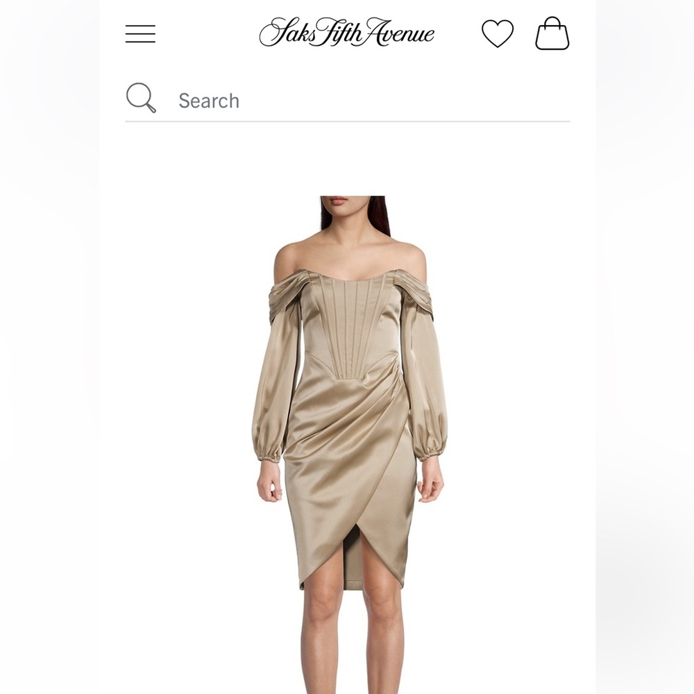 Worn once. Tan/nude balloon sleeve corset dress. Size 6